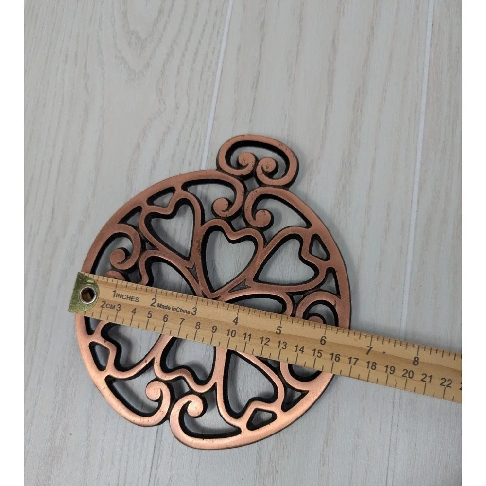 Pampered Chef 2007 copper metal trivet hearts scrolls